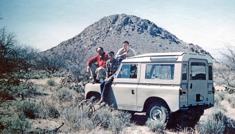 Charles Lowe, Bob Bezy, and Mike Robinson on Mike’s Land Rover at Huerfano Butte. Photo by Jay Cole, 1967