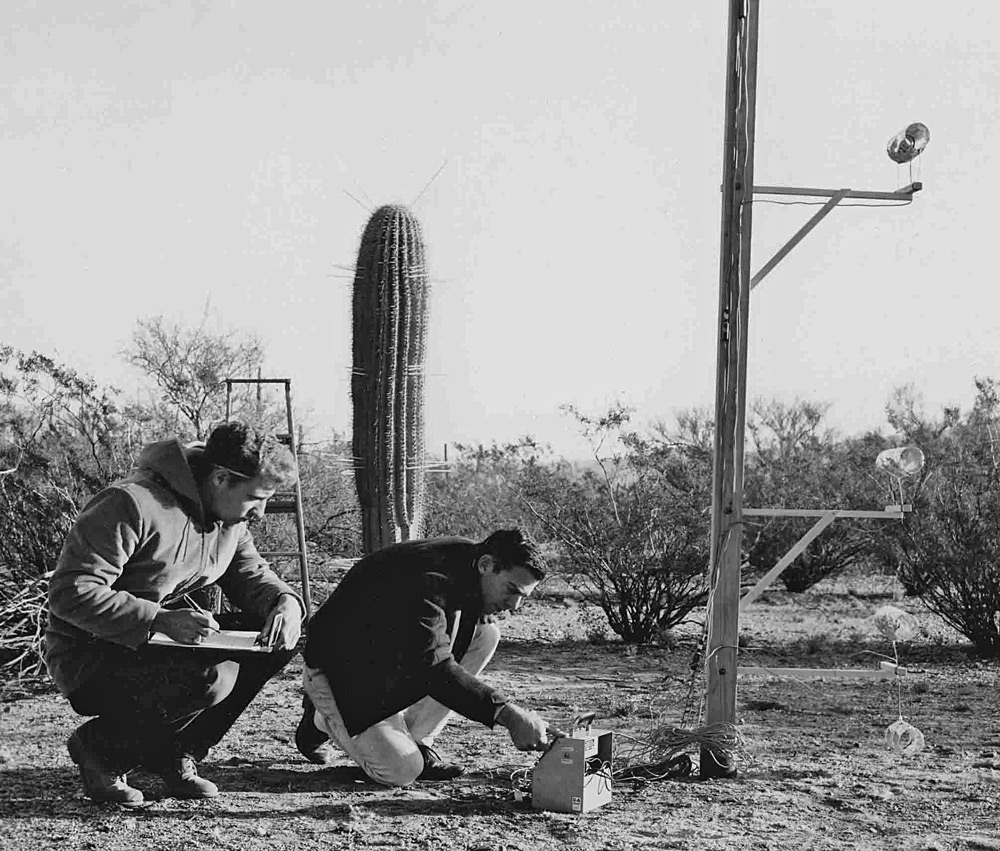 Wade Sherbrooke and Bob Bezy recording data during a saguaro watch in 1965.